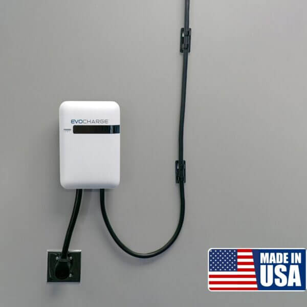 EvoCharge mounted on a gray wall